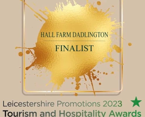 Gold splash showing Hall Farm Dadlington is a finalist in the Leicestershire Promotions 2023 Tourism and Hospitality Awards