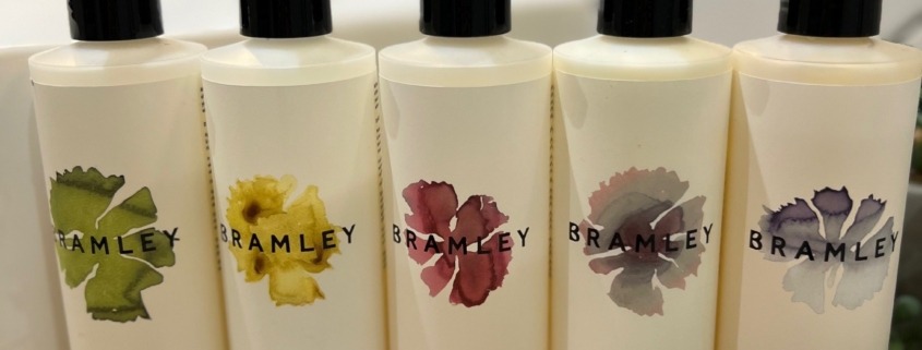 a row of toiletry bottles with the brand name Bramley